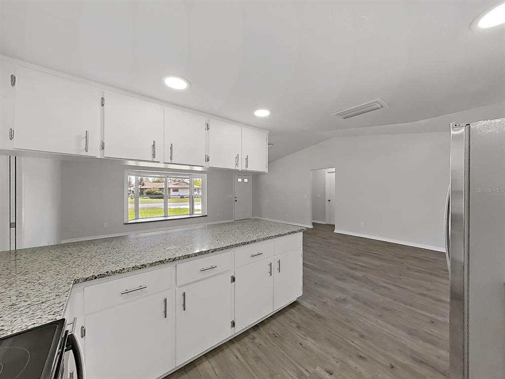 902 Great Pine Point Inverness, FL 34452 - Photo 17 of 39 a kitchen with appliances cabinets and a counter top space