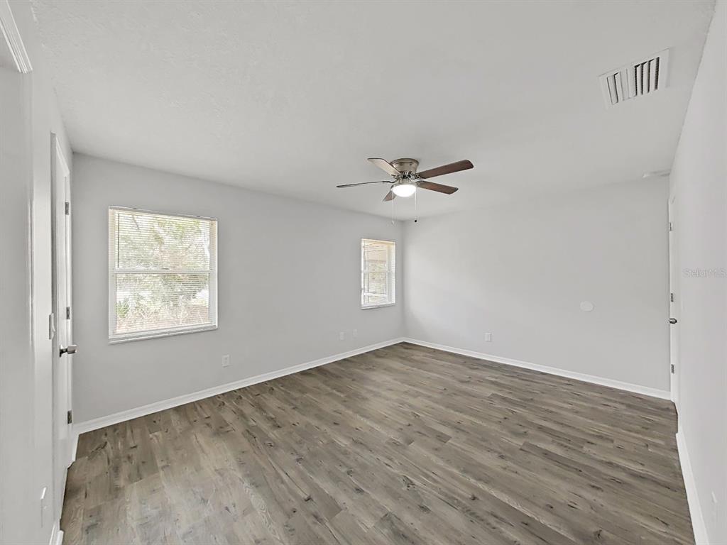 902 Great Pine Point Inverness, FL 34452 - Photo 21 of 39 a view of an empty room with a window