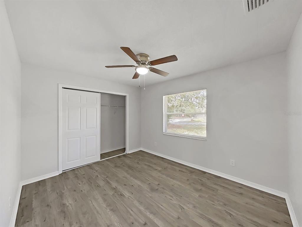902 Great Pine Point Inverness, FL 34452 - Photo 29 of 39 a view of an empty room with a window