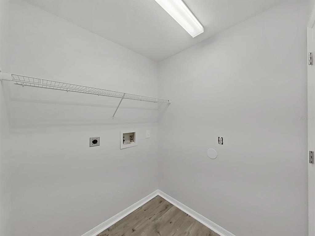 902 Great Pine Point Inverness, FL 34452 - Photo 32 of 39 a small space with a fan