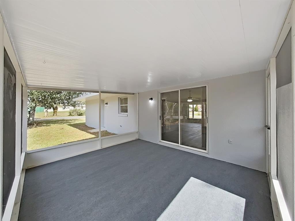 902 Great Pine Point Inverness, FL 34452 - Photo 34 of 39 an empty room with windows
