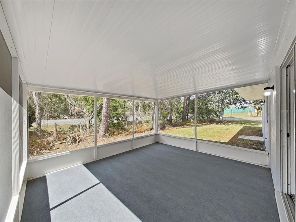 902 Great Pine Point Inverness, FL 34452 - Photo 35 of 39 en view of an empty room with a large window