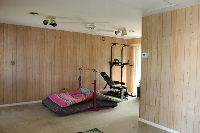a view of a room with gym equipment