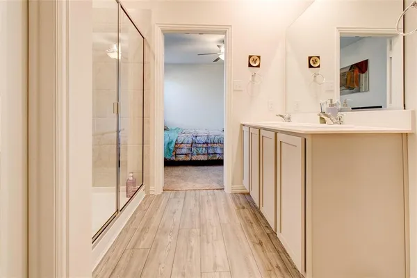 a view of a bathroom from the hallway