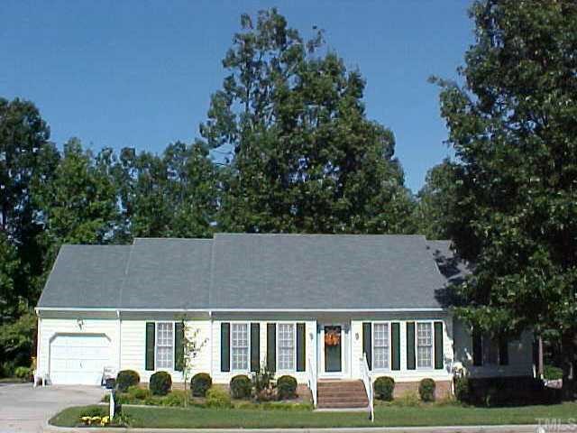 8859 Campfire Trail Raleigh, NC 27615 - Photo 1 of 1 a aerial view of a house with garden and trees