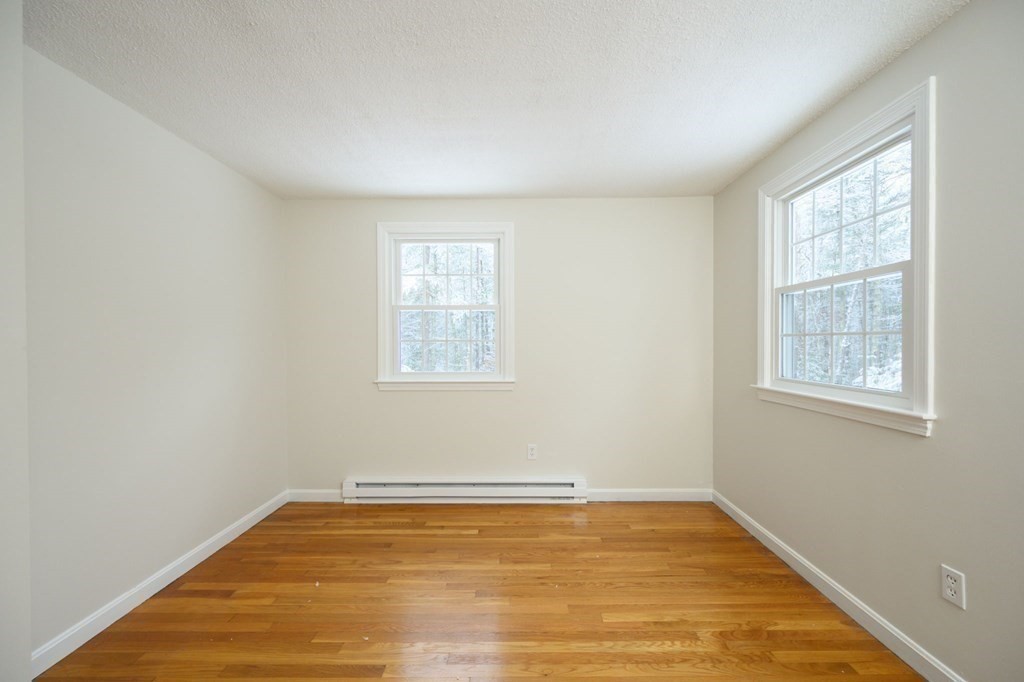 571 Main Street Marshfield, MA 02050 - Photo 16 of 25 an empty room with a window