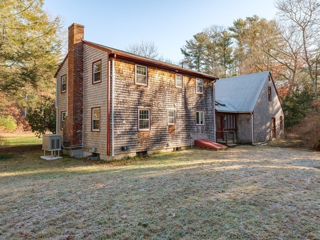 571 Main Street Marshfield, MA 02050 - Photo 22 of 25 a view of a house with a yard and sitting area