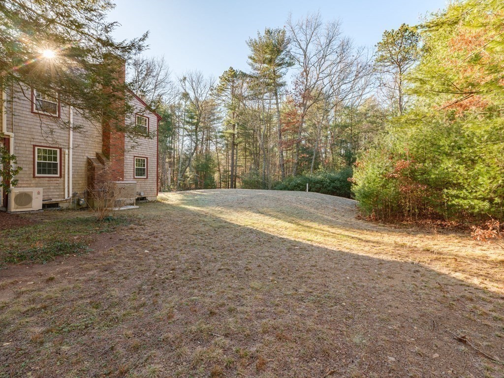 571 Main Street Marshfield, MA 02050 - Photo 25 of 25 a view of a yard with trees on the wall