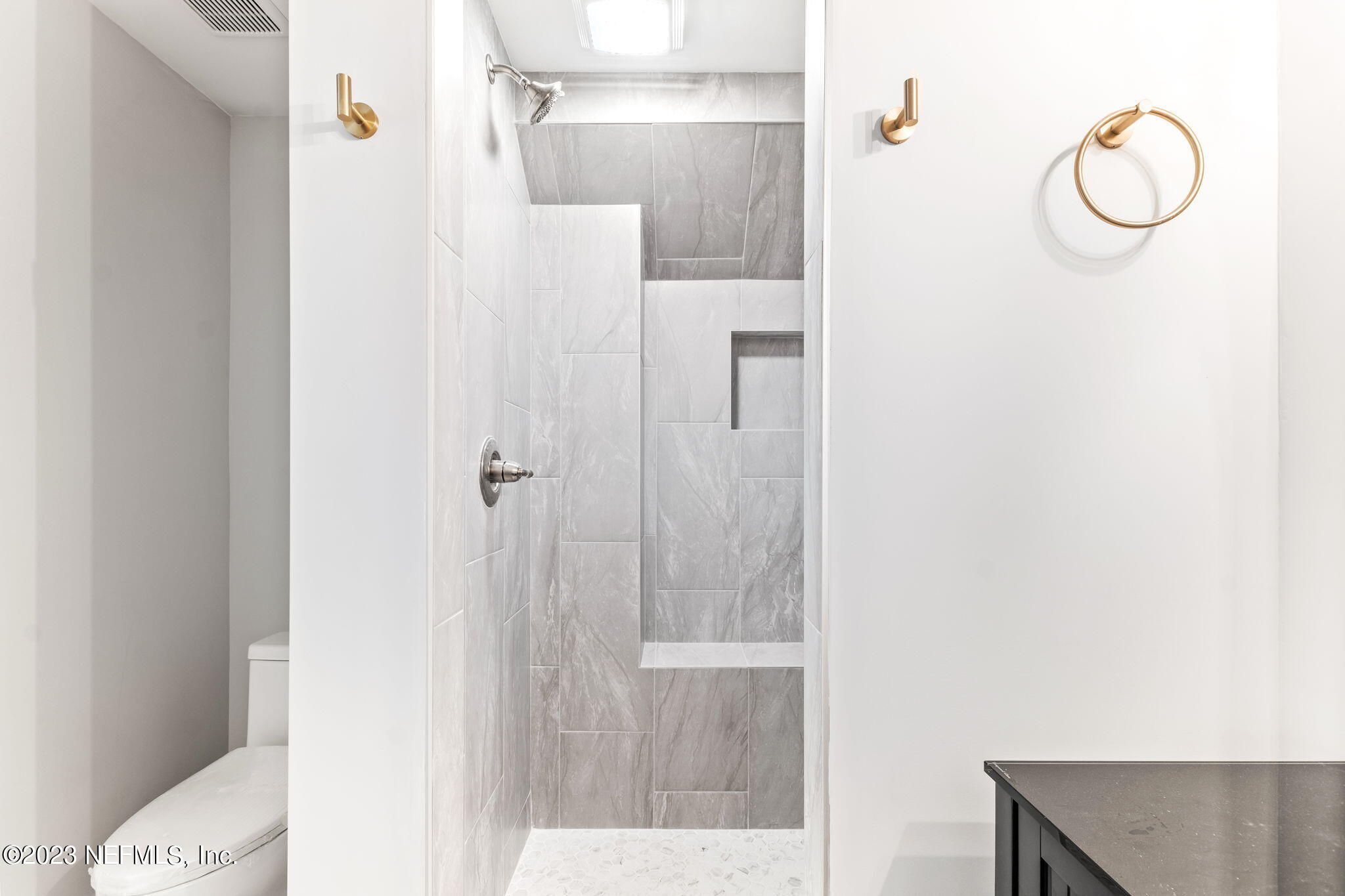 5348 Pelican Way St. Augustine, FL 32080 - Photo 14 of 58 a bathroom with a shower and a sink