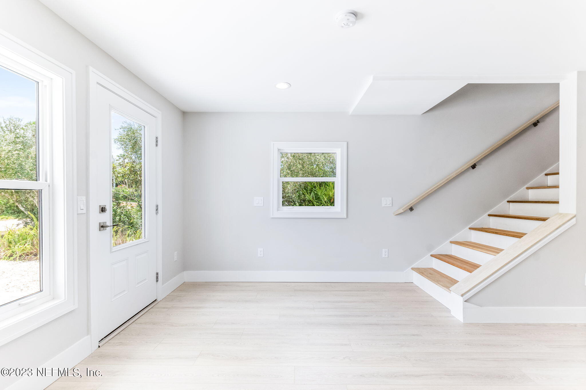 5348 Pelican Way St. Augustine, FL 32080 - Photo 5 of 58 a view of entryway and hall with wooden floor