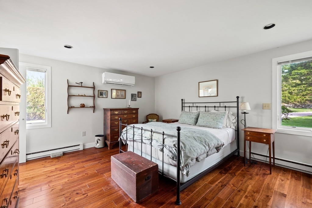 103 Howland Road Westport, MA 02790 - Photo 16 of 35 a bedroom with a bed window and a table