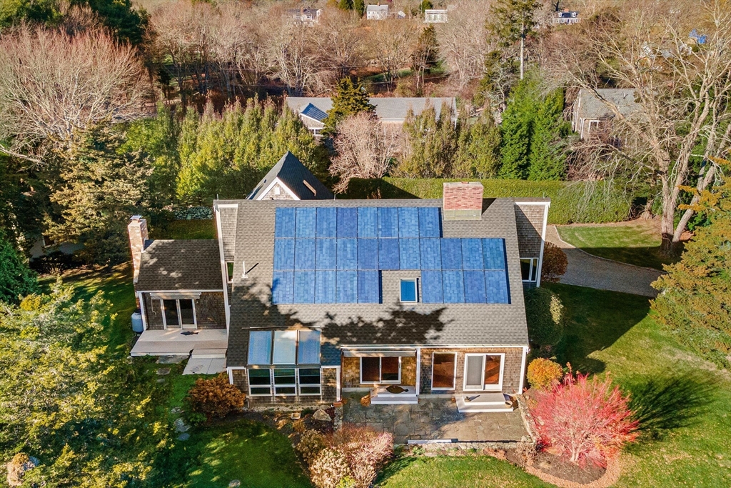 103 Howland Road Westport, MA 02790 - Photo 2 of 35 an aerial view of a house with a yard