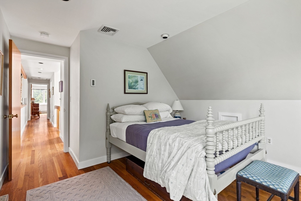 103 Howland Road Westport, MA 02790 - Photo 22 of 35 a bedroom with a bed and a table