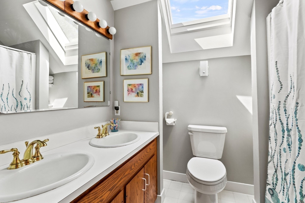 103 Howland Road Westport, MA 02790 - Photo 24 of 35 a bathroom with a sink toilet and shower
