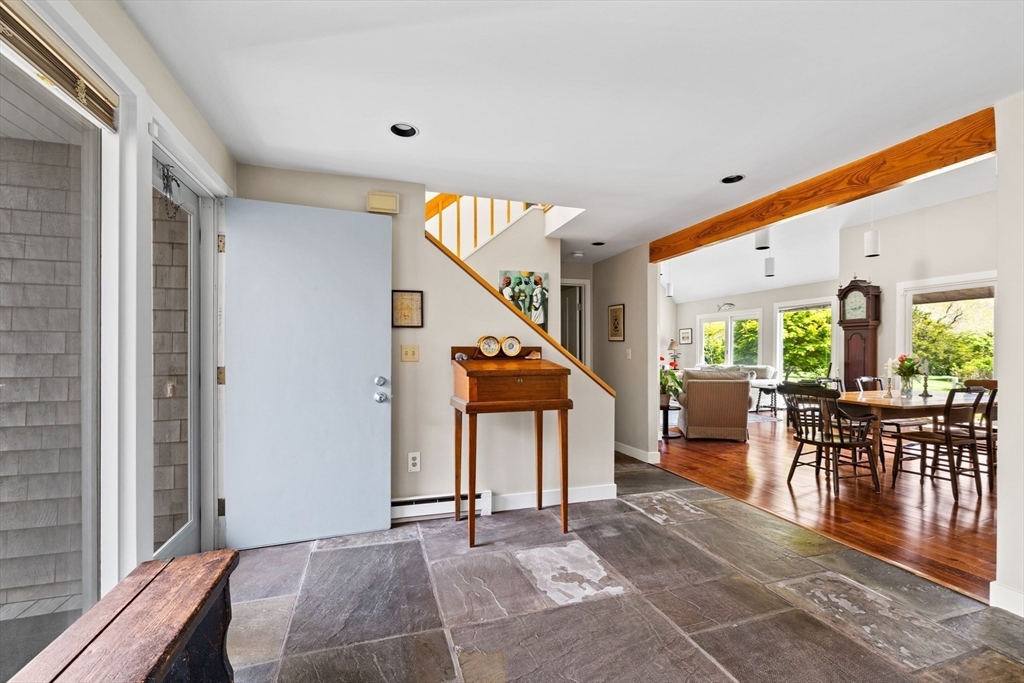 103 Howland Road Westport, MA 02790 - Photo 6 of 35 a view of a livingroom with furniture and staircase