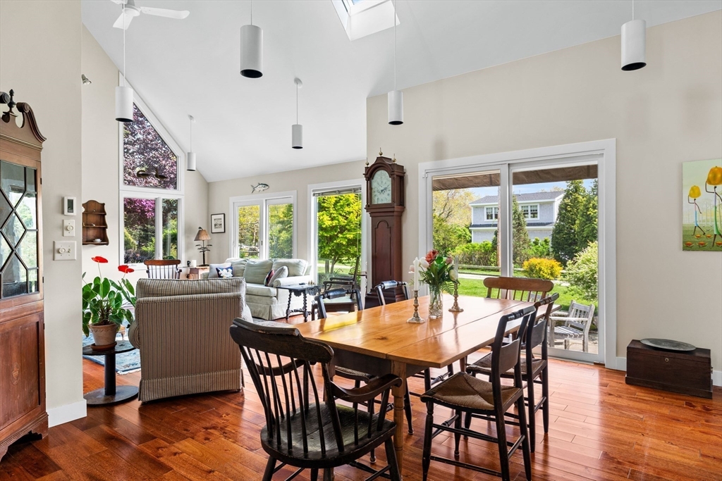 103 Howland Road Westport, MA 02790 - Photo 9 of 35 a dining room with furniture window and wooden floor
