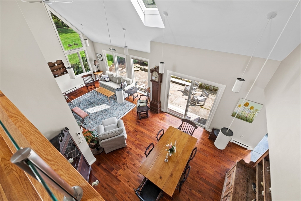 103 Howland Road Westport, MA 02790 - Photo 10 of 35 a living room with furniture rug and a large window