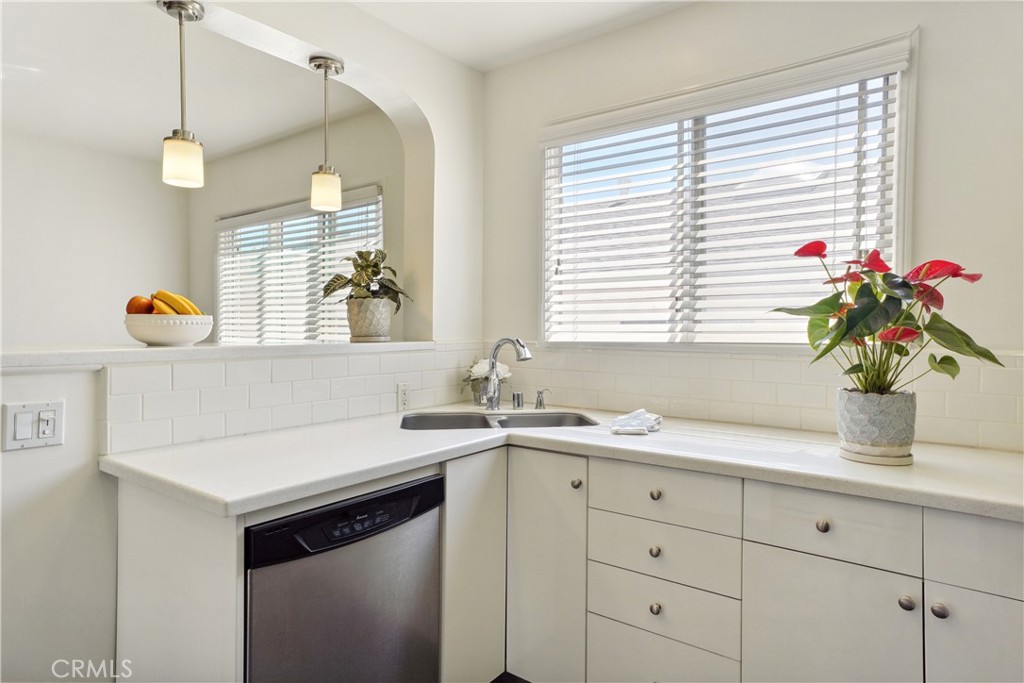 11767 Sunset Boulevard, Unit 202 Los Angeles, CA 90049 - Photo 13 of 22 a kitchen with a sink and a window