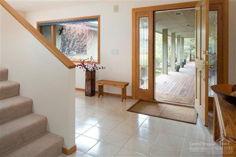 12 North Course Lane Sunriver, OR 97707 - Photo 2 of 18 The covered entry walk-up and large tile