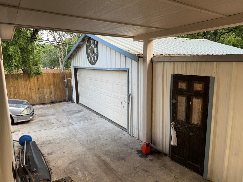 3307 Roberts Cut Off Road Lake Worth, TX 76135 - Photo 12 of 14 a front view of a house with garden