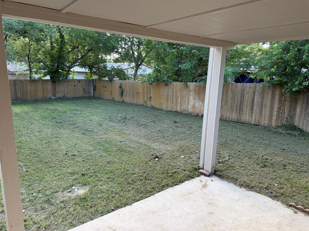 3307 Roberts Cut Off Road Lake Worth, TX 76135 - Photo 14 of 14 a backyard of a house with lots of green space