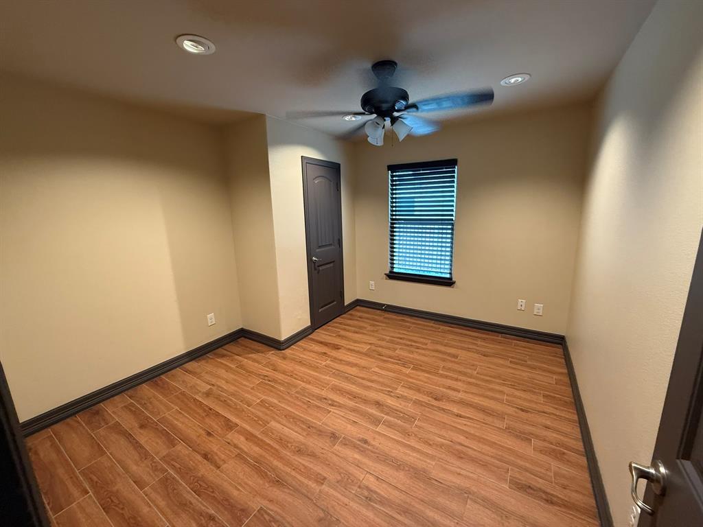 3307 Roberts Cut Off Road Lake Worth, TX 76135 - Photo 8 of 14 a view of empty room with wooden floor