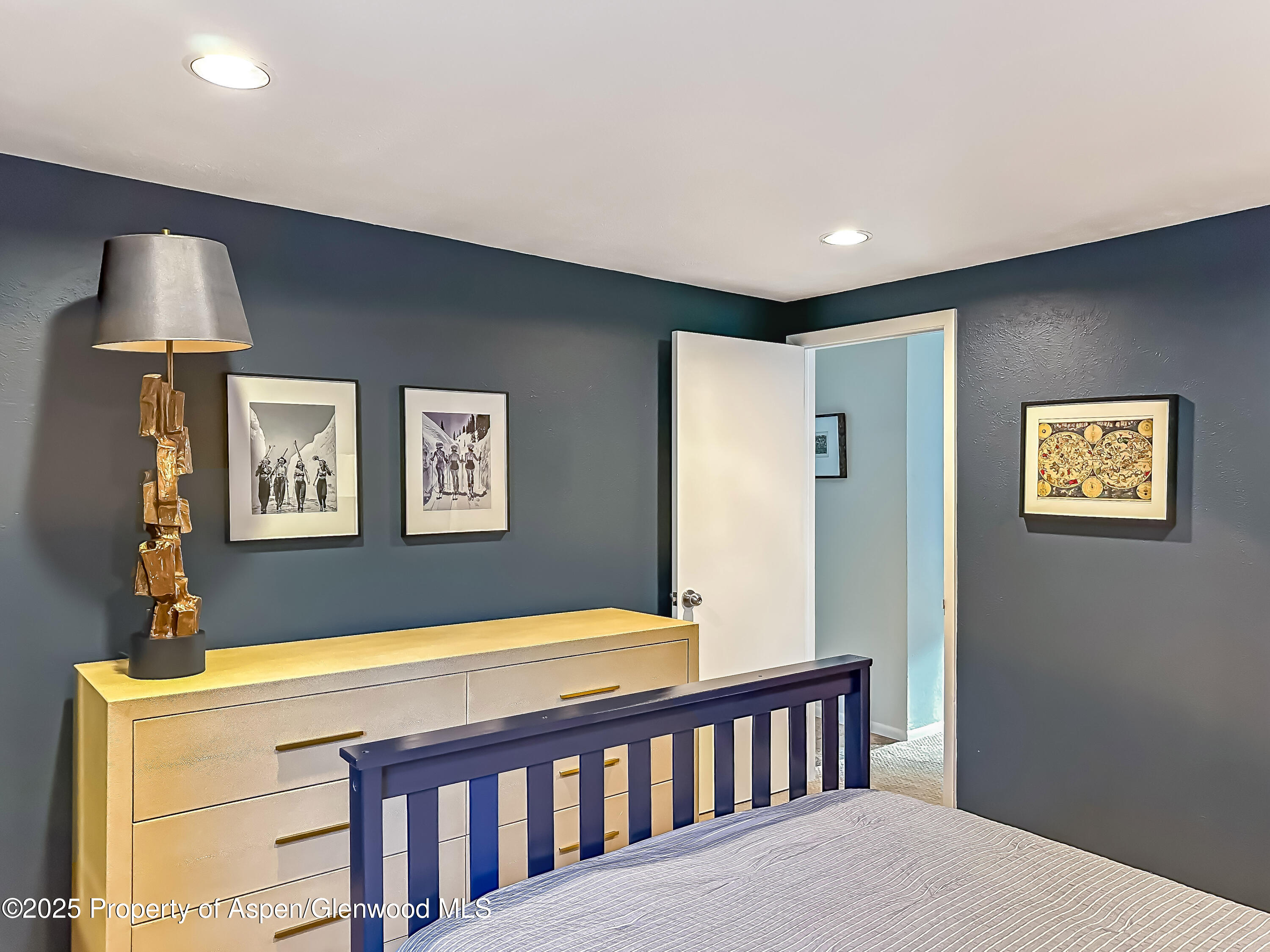 1050 Waters Avenue, Unit 9 Aspen, CO 81611 - Photo 15 of 19 a view of a livingroom with a couch