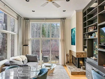 a living room with furniture and a window