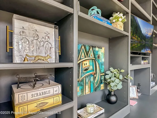 a bathroom with a sink mirror and vanity
