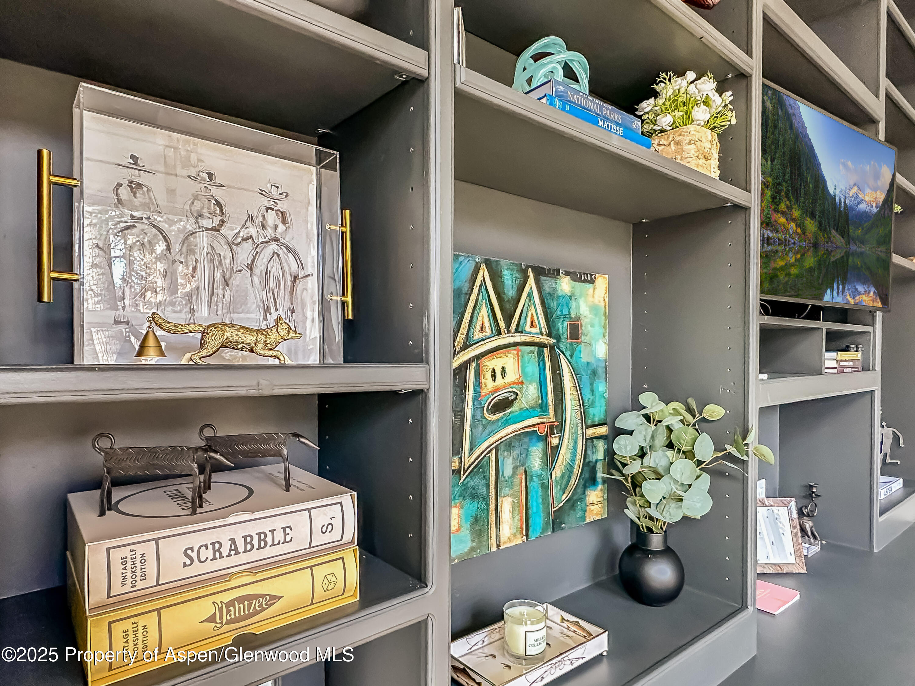 1050 Waters Avenue, Unit 9 Aspen, CO 81611 - Photo 4 of 19 a bathroom with a sink mirror and vanity