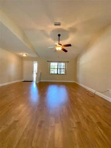 a view of an empty room and window