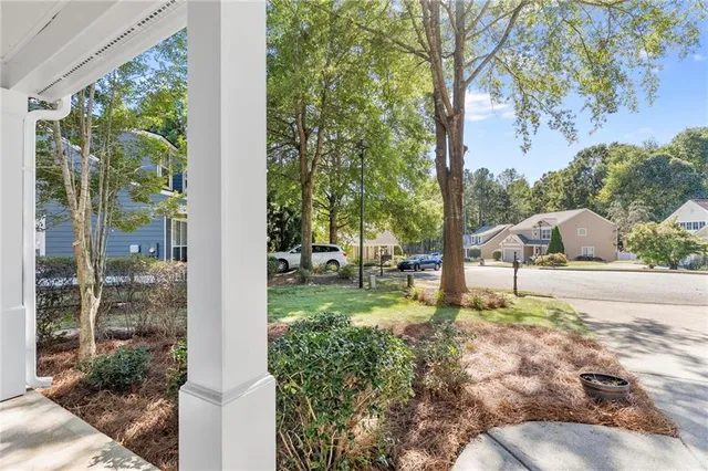 a view of a back yard of the house