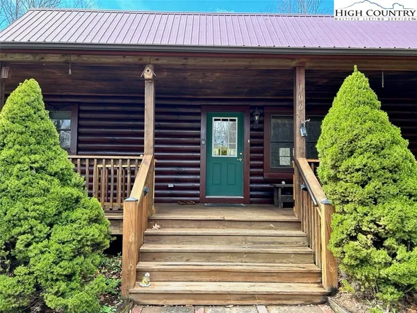 a view of entryway with a front door