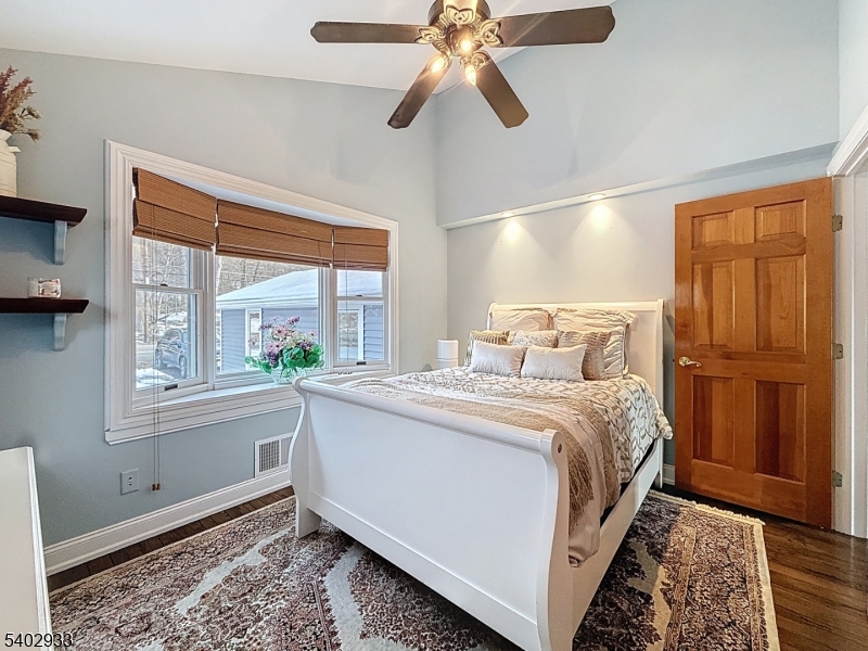 96 East Shore Trail Sparta, NJ 07871 - Photo 13 of 44 a bedroom with a bed and a window