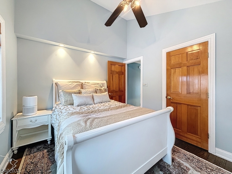 96 East Shore Trail Sparta, NJ 07871 - Photo 14 of 44 a bedroom with a bed and a dresser