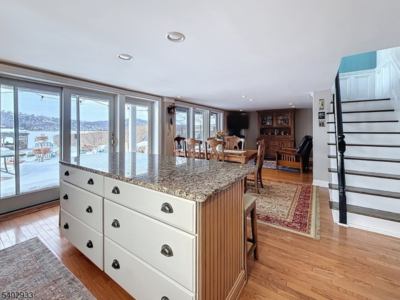 96 East Shore Trail Sparta, NJ 07871 - Photo 22 of 44 a living room with furniture and wooden floor