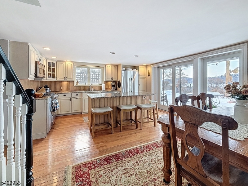96 East Shore Trail Sparta, NJ 07871 - Photo 23 of 44 a view of a dining room with furniture window and wooden floor
