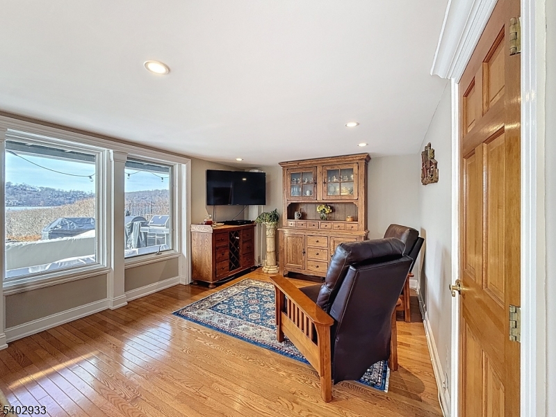 96 East Shore Trail Sparta, NJ 07871 - Photo 24 of 44 a living room with furniture and a large window
