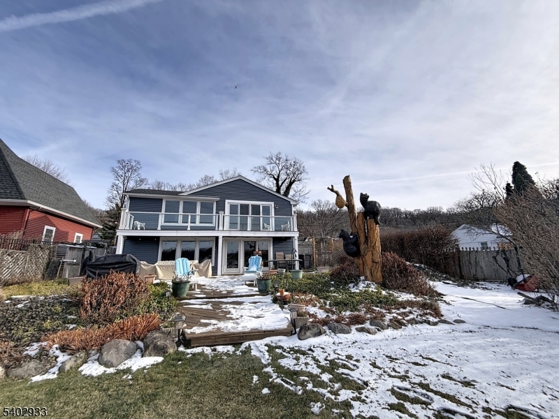96 East Shore Trail Sparta, NJ 07871 - Photo 8 of 44 a front view of a house with a yard