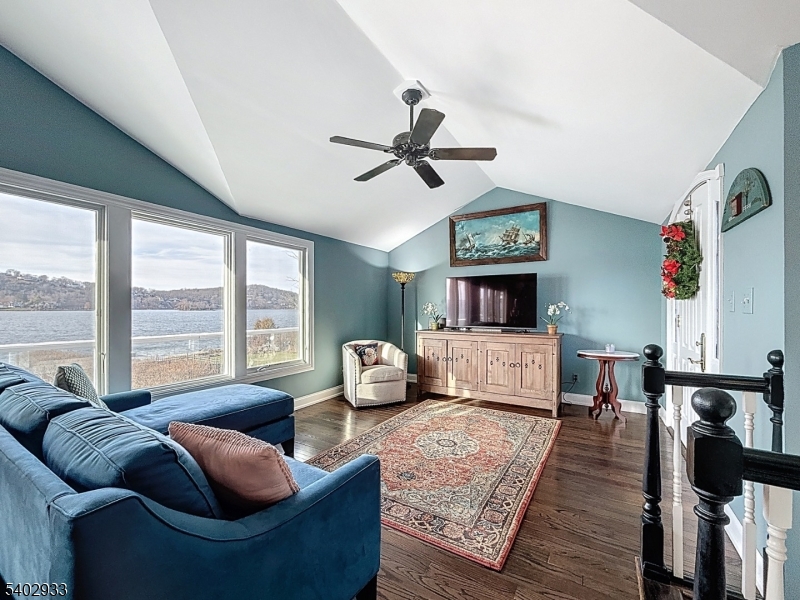 96 East Shore Trail Sparta, NJ 07871 - Photo 10 of 44 a living room with furniture and a large window