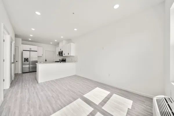 a view of parking garage with cars