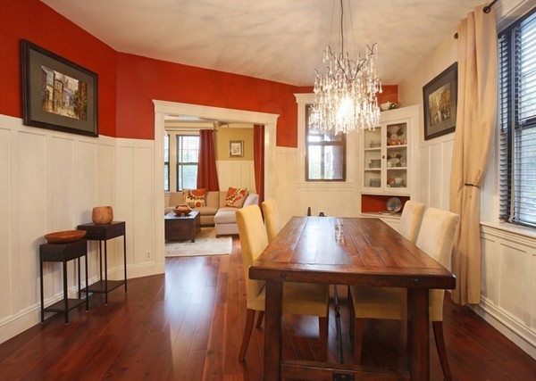 34 Garrison Road, Unit 2 Brookline, MA 02445 - Photo 2 of 7 a view of a dining room with furniture window and wooden floor