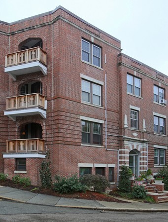 34 Garrison Road, Unit 2 Brookline, MA 02445 - Photo 7 of 7 a building view that has a lots of windows