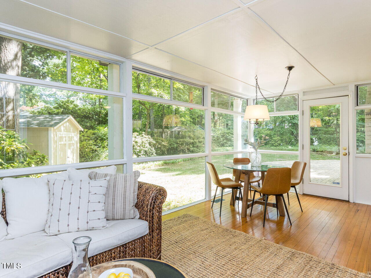 608 Ortega Road Raleigh, NC 27609 - Photo 16 of 34 Dine or play games in the sunroom!