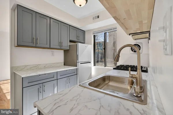 a bathroom with a sink and a bathtub