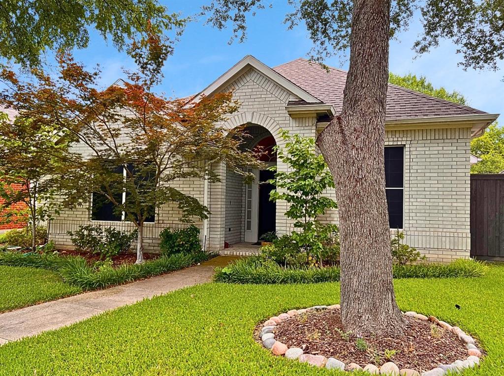 305 Parkhurst Lane Allen, TX 75013 - Photo 1 of 1 a front view of a house with a garden