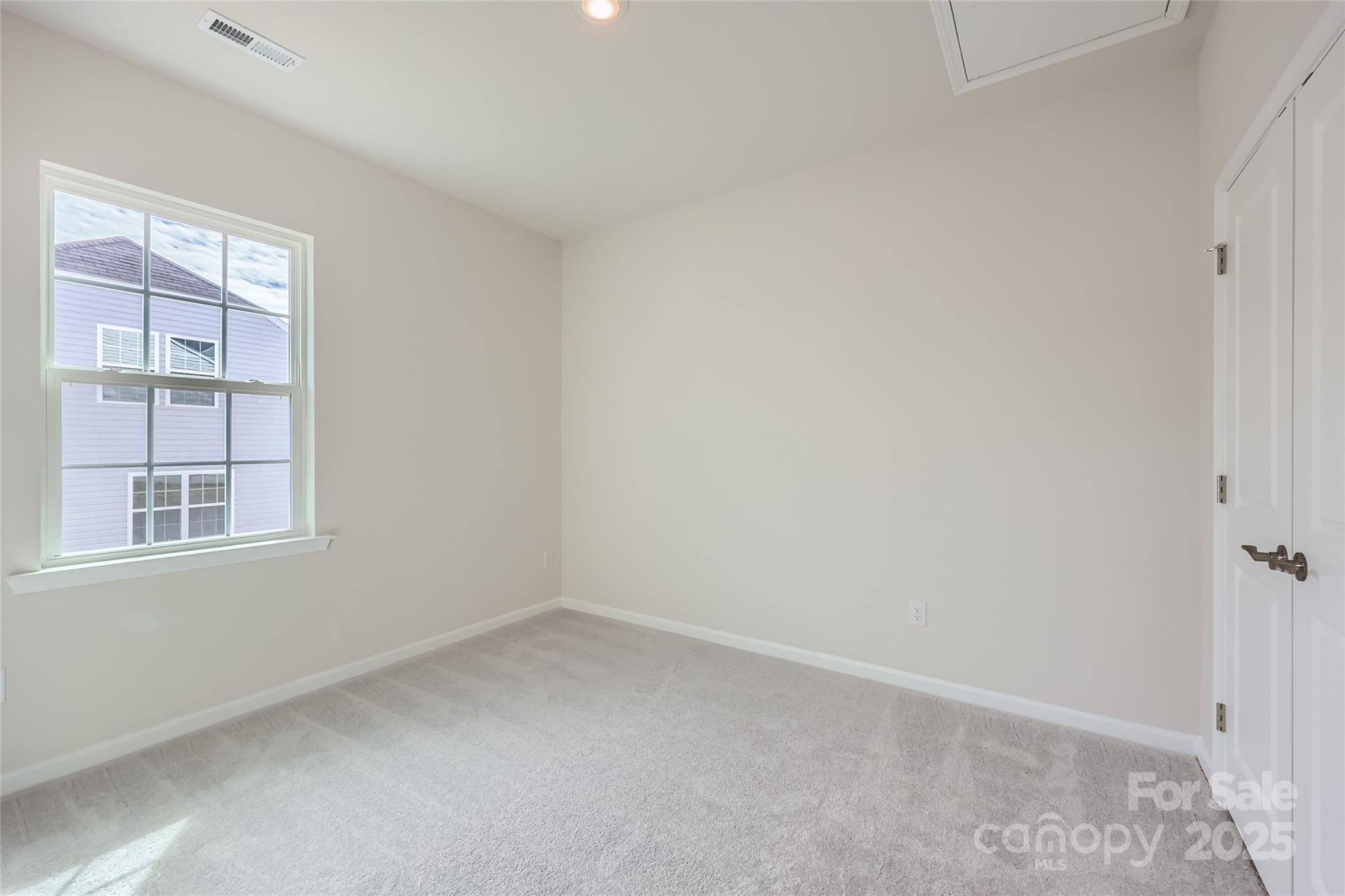 5932 Oak Br Circle Maiden, NC 28650 - Photo 11 of 13 an empty room with a window