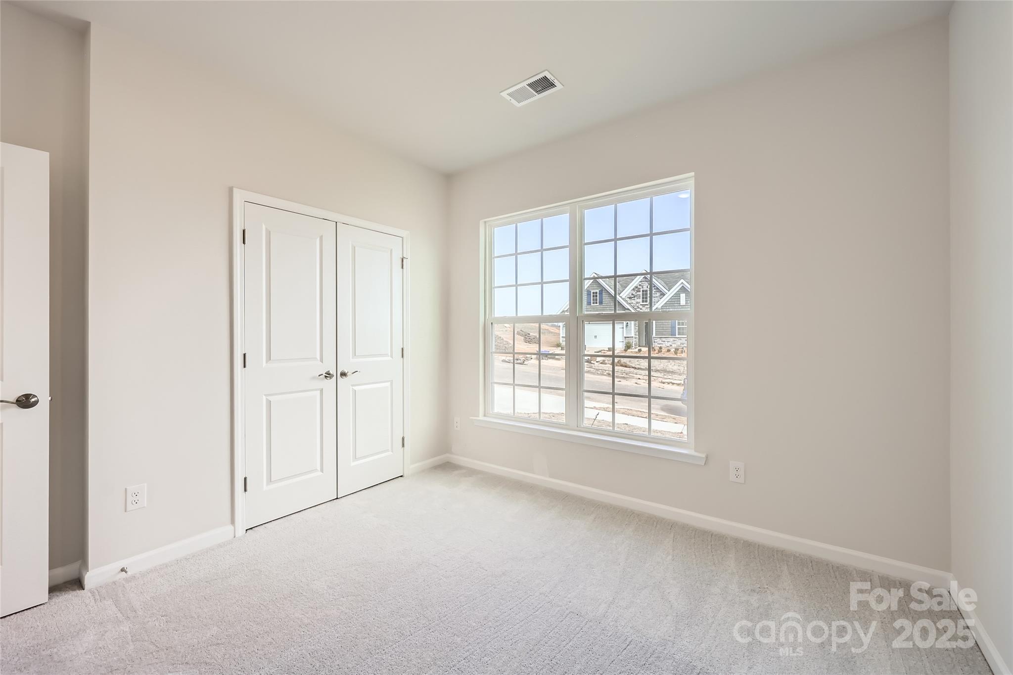 5932 Oak Br Circle Maiden, NC 28650 - Photo 9 of 13 an empty room with a window