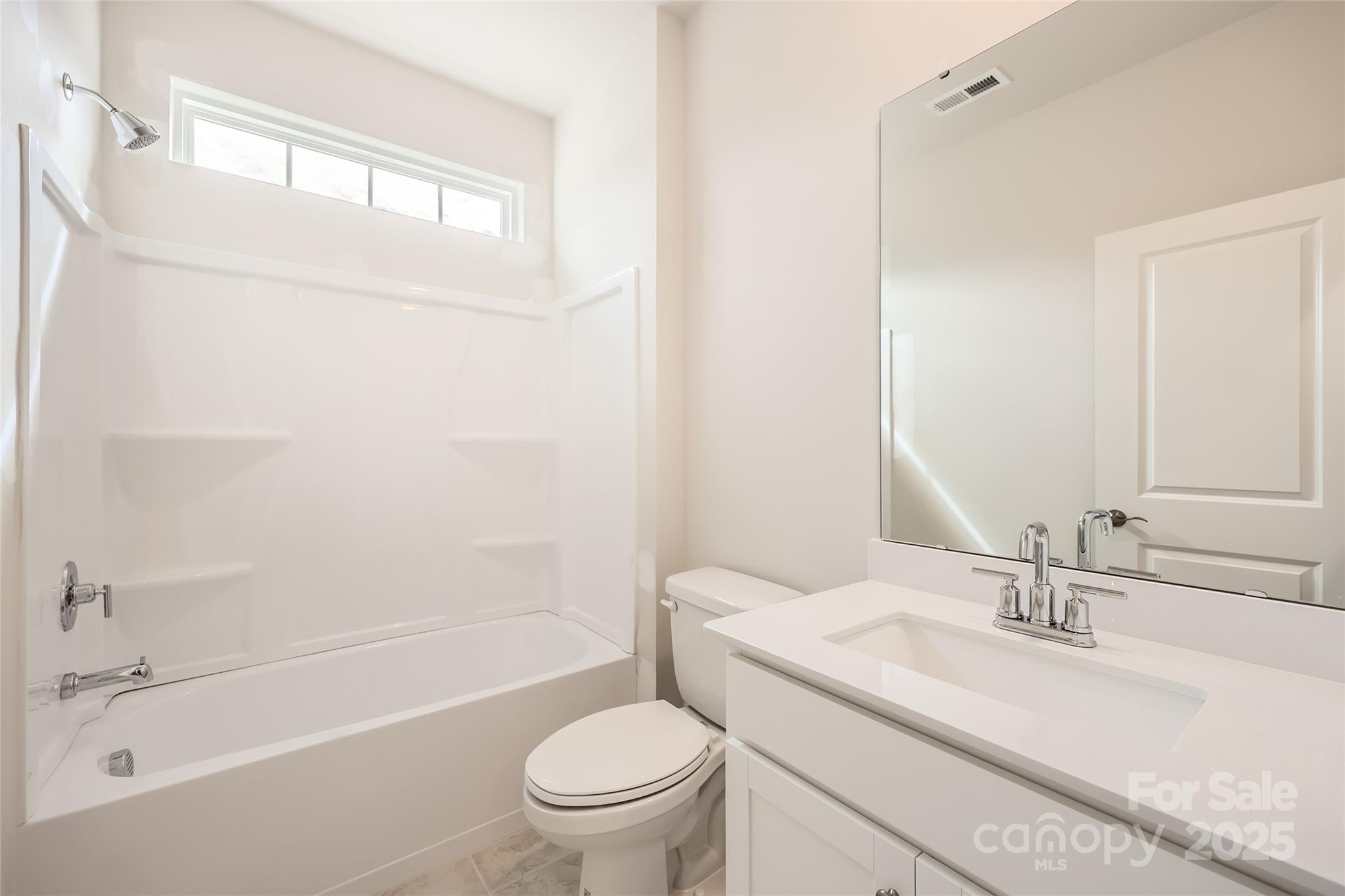 5932 Oak Br Circle Maiden, NC 28650 - Photo 10 of 13 a bathroom with a granite countertop sink toilet and shower