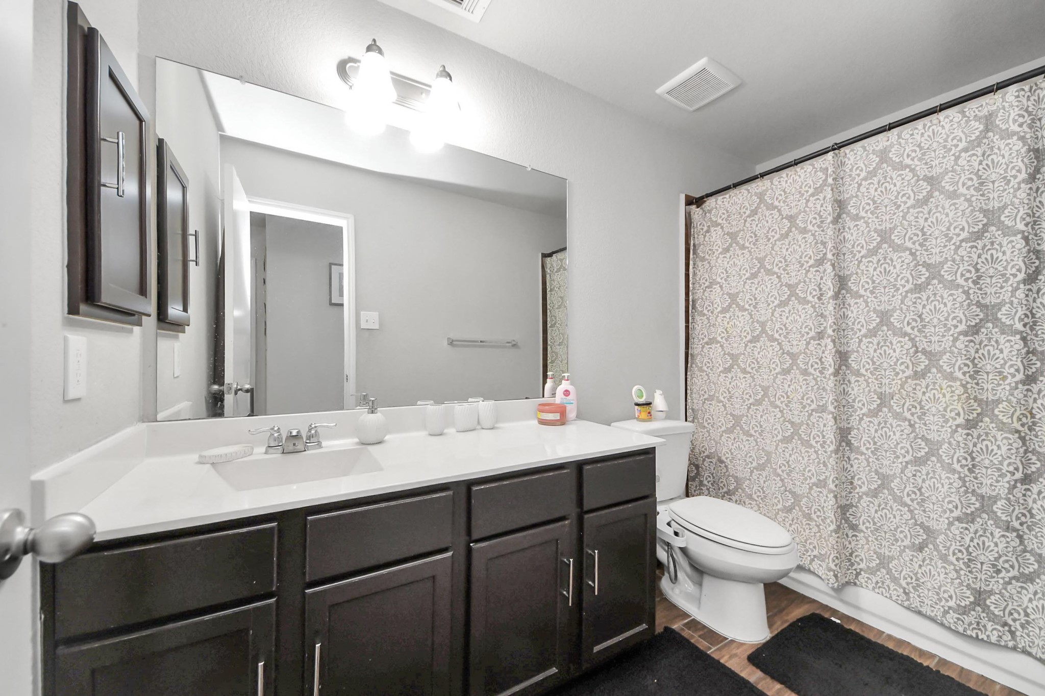 2643 Ridgeback Drive Rosenberg, TX 77471 - Photo 37 of 46 a bathroom with a sink toilet and mirror
